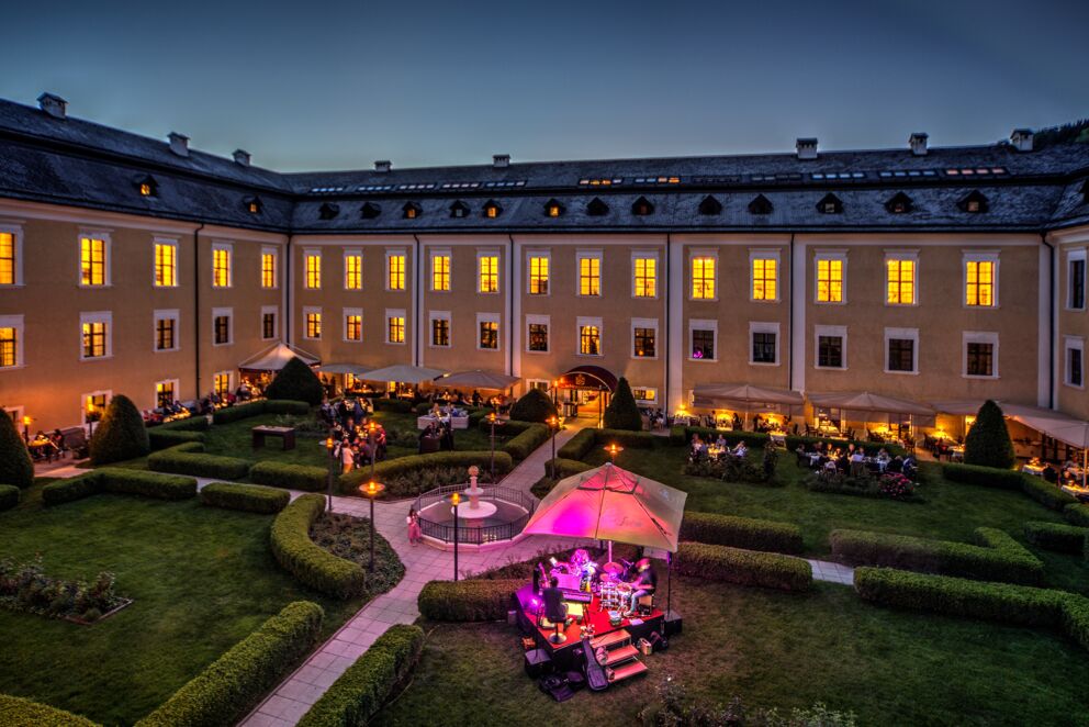 Dinner in the castle garden of the Schlosshotel Mondsee in Salzkammergut